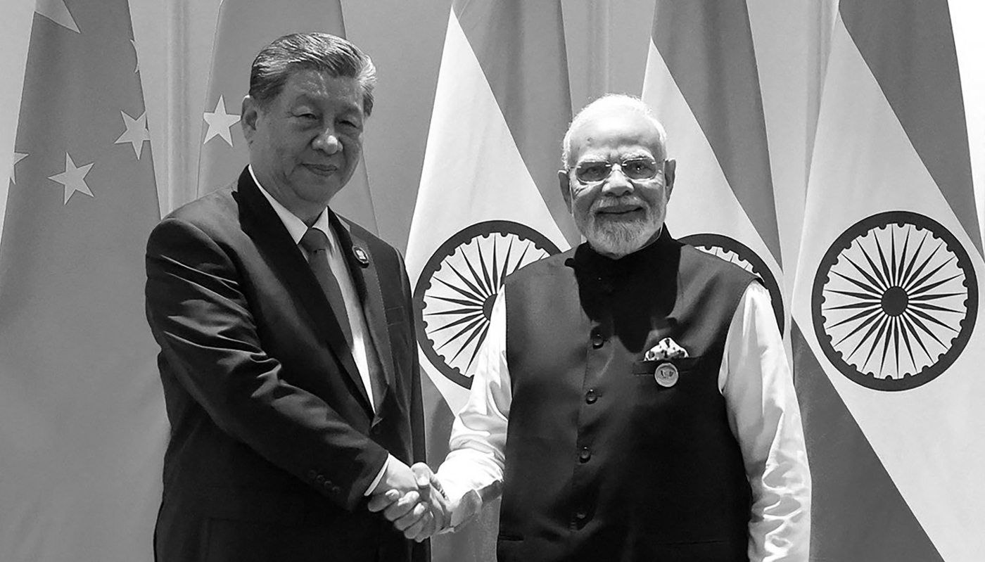 China's President Xi Jinping and India's Prime Minister Narendra Modi in New Delhi on 12 September.