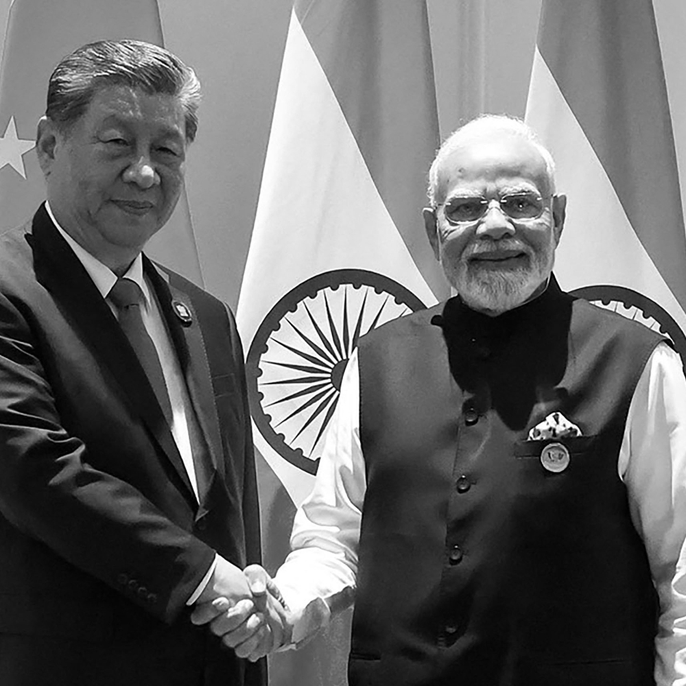 China's President Xi Jinping and India's Prime Minister Narendra Modi in New Delhi on 12 September.