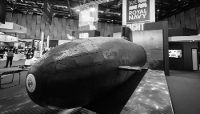 A scale model of the SSN-AUKUS (Submersible Ship Nuclear – AUKUS) on display at the Royal Navy’s stand on the third day of the Defence and Security Equipment International (DSEI) trade exhibition in London, on 11 September 2025.