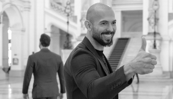 Social media influencer Andrew Tate poses for a photo while entering the Court of Appeal on 15 October 2024 in Bucharest, Romania.