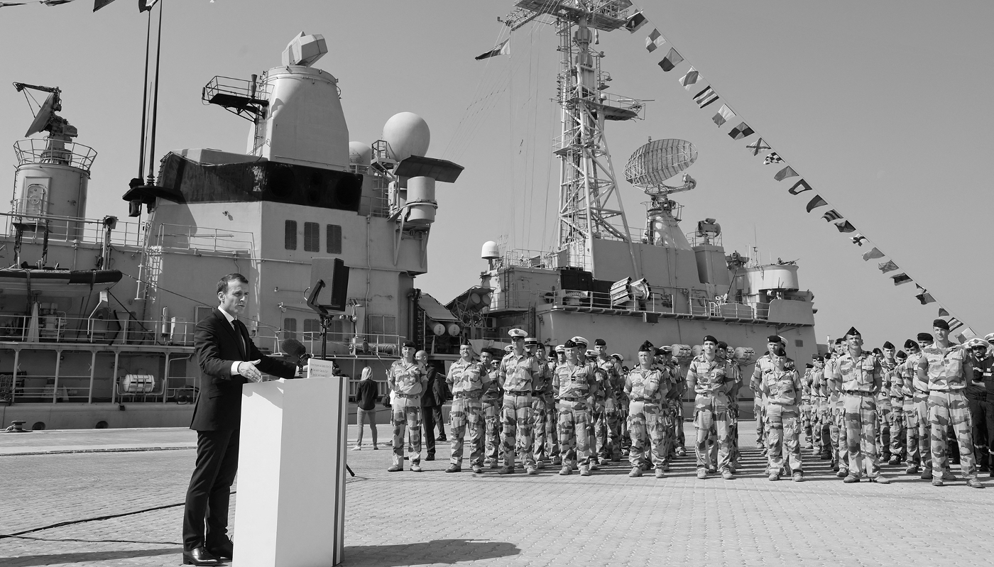 French President Emmanuel Macron visits French naval personnel deployed at a naval base in Abu Dhabi, on 9 November 2017.