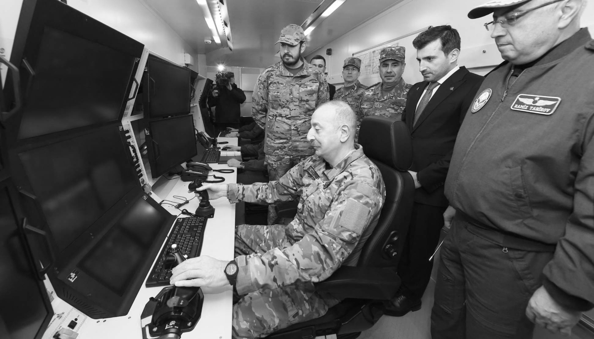 Azerbaijani President Ilham Aliyev orchestrating the flight of the Bayraktar AKINCI alongside the chairman of the board and technology leader of Baykar, Selcuk Bayraktar, during a visit to an Azerbaijani Air Force facility in Azerbaijan, on 9 February 2024