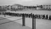 Cambodian soldiers walk in formation during The inauguration ceremony of the modernised infrastructure at Ream Naval Base and the Cambodia-China Joint Logistics and Training Center at the Ream naval base in Preah, Sihanouk province on April 5, 2025.