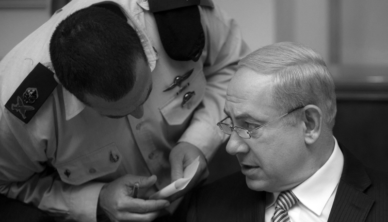 Israeli Prime Minister Benjamin Netanyahu speaks with his military adviser Eyal Zamir in Jerusalem on 28 April 2013. Zamir is now the Chief of the General Staff of the Israel Defense Forces.