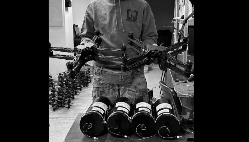 An operator from the third Azov assault brigade holds a Hyllus Systems fibre-optic drone.