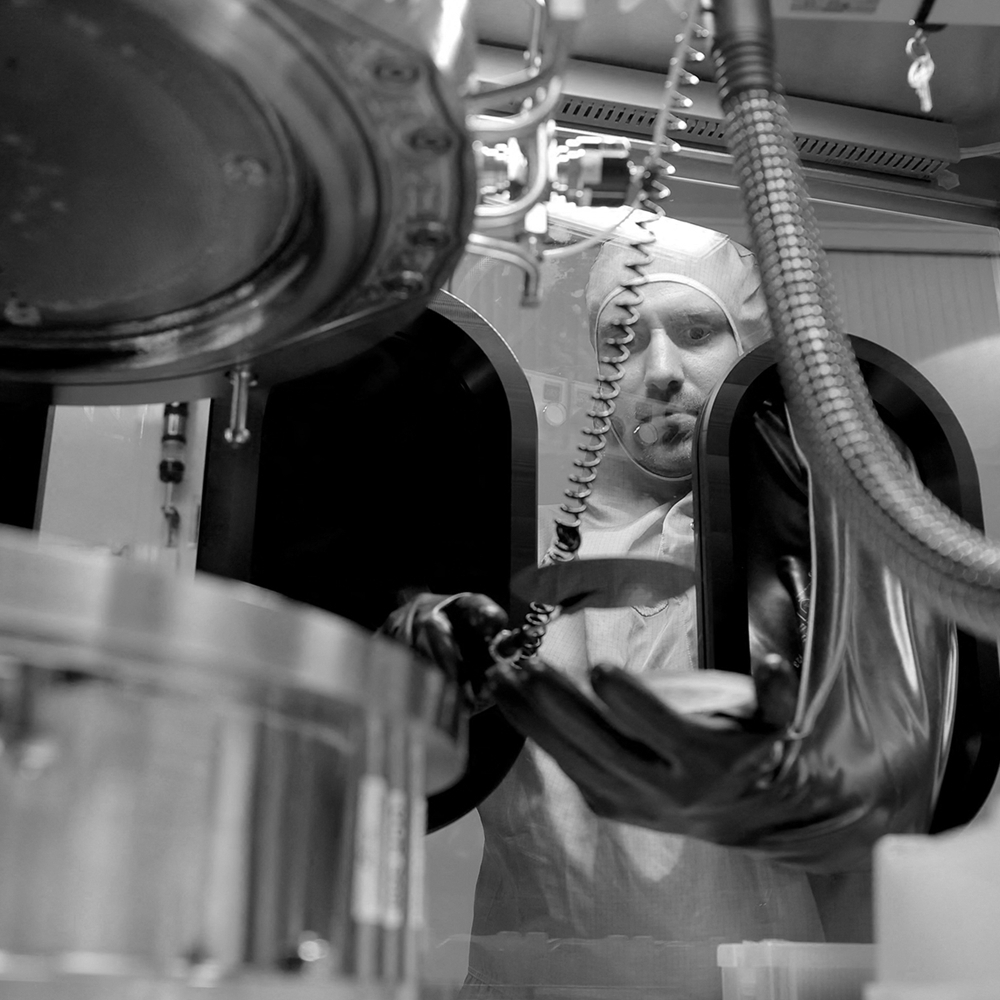 A research scientist handles a wafer in a research laboratory at the III-V Lab in Palaiseau, south of Paris, on 16 October 2024.
