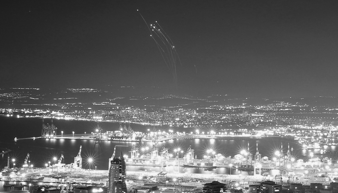 An Israeli anti-missile system targeting rockets fired from Lebanon, seen from Haifa, Israel, 24 September 2024.