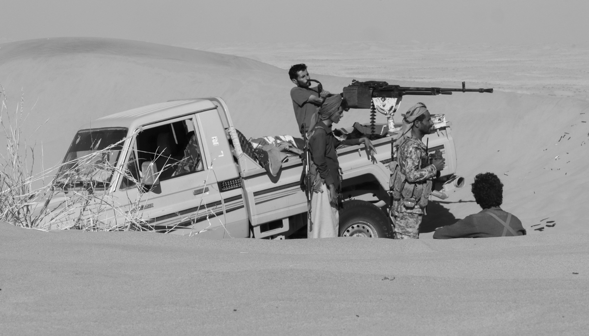 Pro-government tribal fighters in a desert area southeast of Marib, Yemen, 6 December 2021.