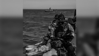 Combat swimmers from Ukraine's GUR military intelligence during an exercise in the Black Sea.