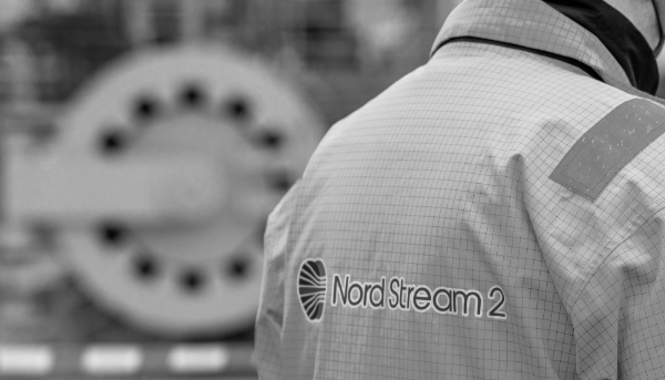 An employee wearing a Nord Stream 2 safety jacket. 