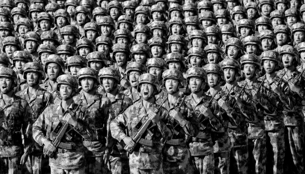 Soldiers from the People's Liberation Army during a military parade commemorating the army's 90th anniversary at Zhurihe Military Training Base in China's autonomous region of Inner Mongolia on 30 July 2017.