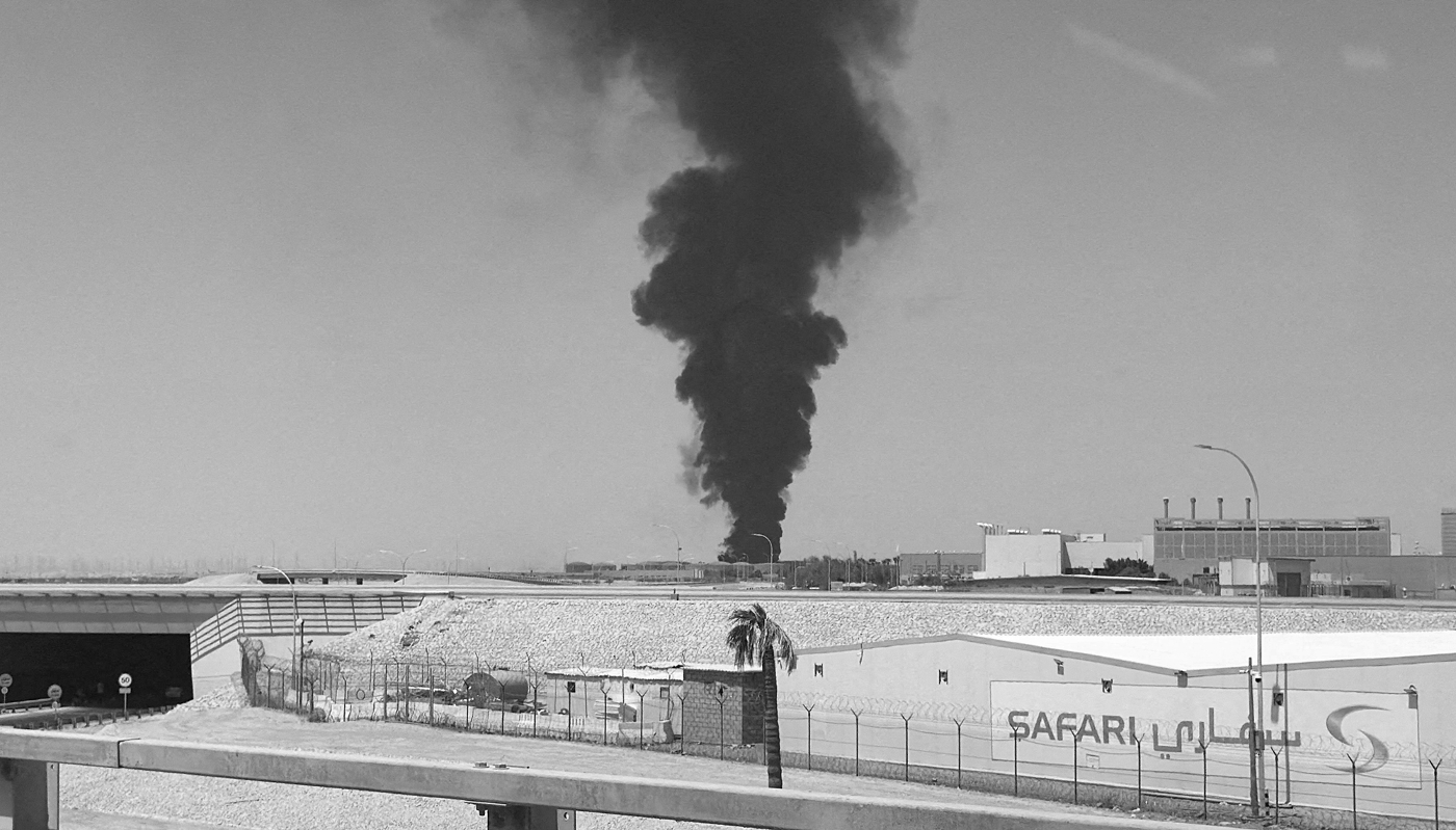 Smoke rises from King Khalid International Airport in Riyadh, Saudi Arabia.