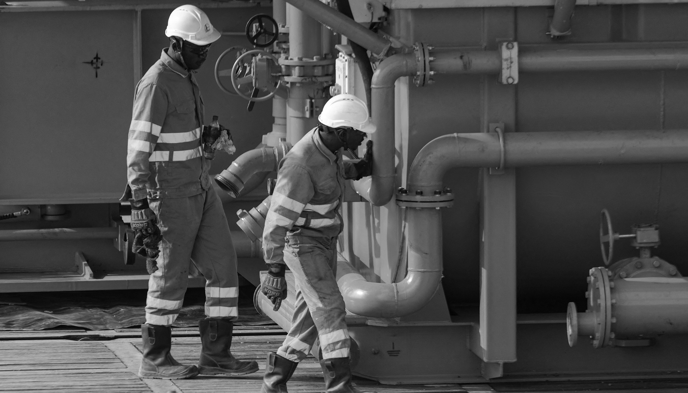 TotalEnergies employees work on the construction of a drilling platform in Murchison Falls National Park, western Uganda, 22 February 2023.