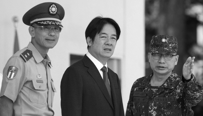Taiwanese President Lai Ching-te (C) visits a military base in Kaohsiung, Taiwan, on 16 May 2025.