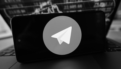 The Telegram logo is displayed on a smartphone, March 16, 2026.