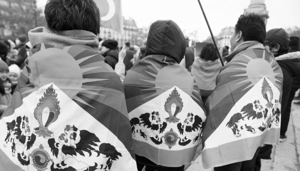 Pro-Tibet demonstrators taking part in a protest against the persecution of the Uyghurs, Paris, 3 December 2022.