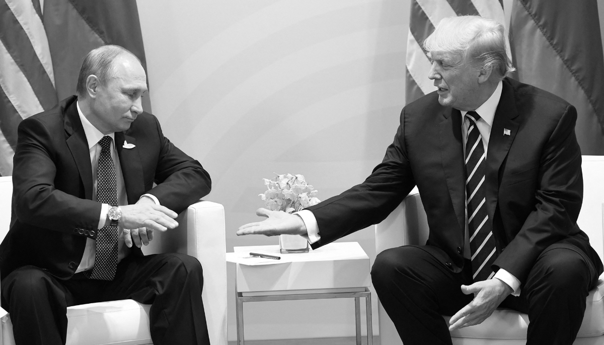US President Donald Trump and Russia's President Vladimir Putin shake hands during a meeting on the sidelines of the G20 Summit in Hamburg, Germany, on 7 July 2017. 