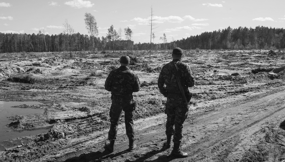 Specialised Ukrainian Interior Ministry troops at an unauthorised amber mine in Rivne region, north-west Ukraine, 21 April 2016.