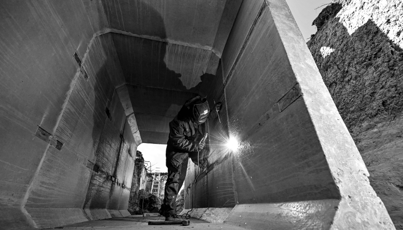 A welder working on the construction of fortifications on the front line in Ukraine's southeastern Zaporizhzhia region, on 11 March 2024.