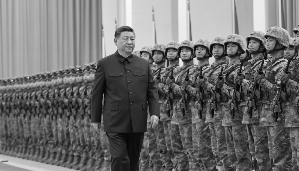 Chinese President Xi Jinping reviews troops during his inspection of the Chinese People's Liberation Army (PLA) garrison stationed in the Macao Special Administrative Region in southern China on 20 December 2024.