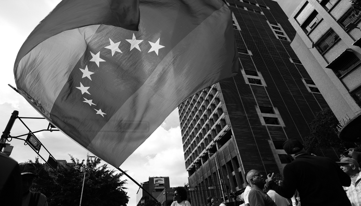 Supporters of Venezuelan President Nicolás Maduro protesting in downtown Caracas against the US attacks on 3 January 2026.