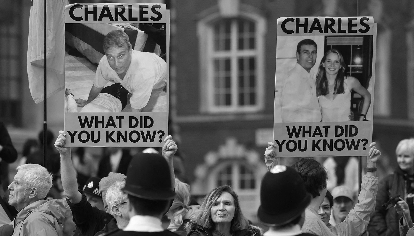 Anti-monarchy protesters holding placards bearing the image of Andrew Mountbatten-Windsor demonstrate in London on 9 March 2026.