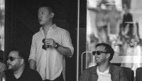 Guren 'Bobby' Zhou, standing with Zach Witkoff, right, in a private suite at the Argentina vs. Spain FIFA World Cup final match in East Rutherford, N.J., on 19 July 2026.