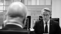 Frontex's Executive Director, Hans Leijtens with Austrian Chancellor Christian Stocker (seen from behind) at the agency’s HQ in Warsaw on 17 September 2026.
