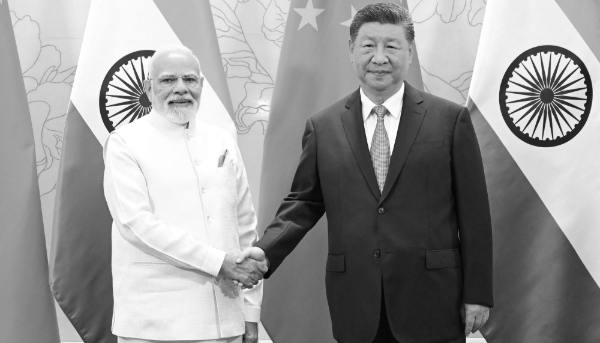 Chinese President Xi Jinping (right) meets with Indian Prime Minister Narendra Modi in Tianjin, northern China, 31 August 2025.