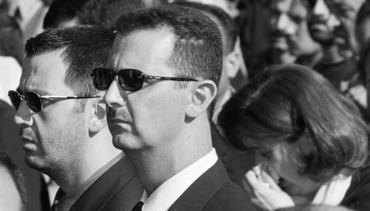 Archive photo of Bashar al-Assad (right) and his younger brother Maher (left) at the state funeral of their father Hafez al-Assad in Damascus on 13 June 2000.