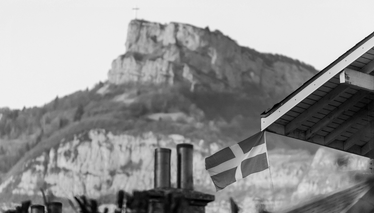 A Savoyard flag hanging from a balcony in Chambéry, France.
