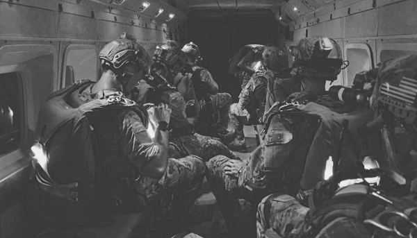 Operational jumpers from the SEAL Team Six unit ready for a clandestine operation.
