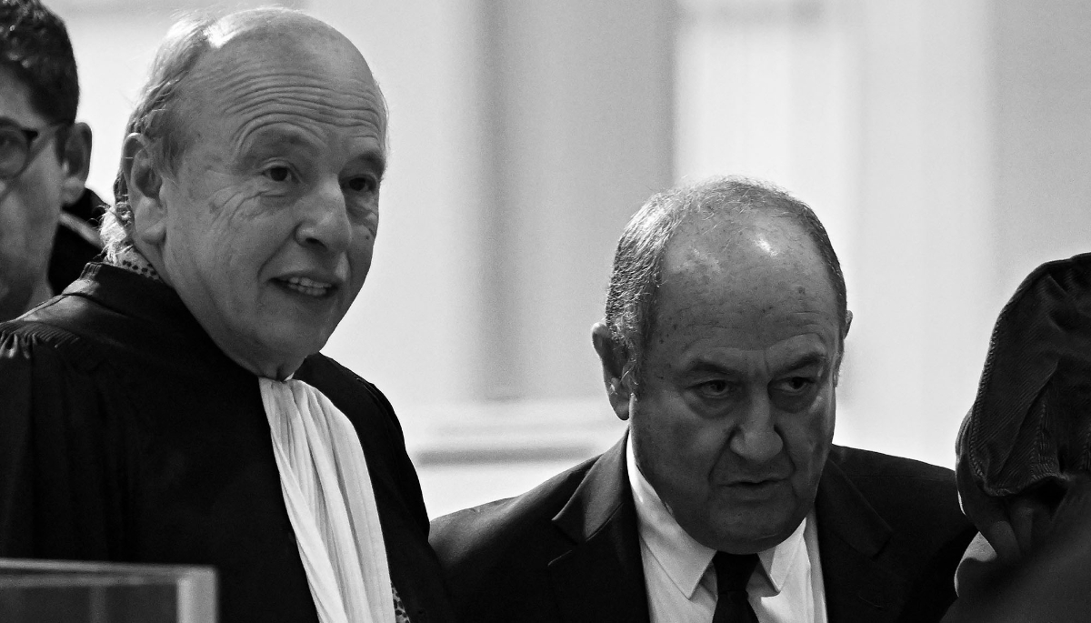 Former French intelligence head Bernard Squarcini (R) arrives with Christian Orsatelli's lawyer Dominique Mattei for a hearing of his trial in which he is accused with nine others of spying on French newspaper Fakir and its owner for French luxury group LVMH, in Paris on November 28, 2024.
