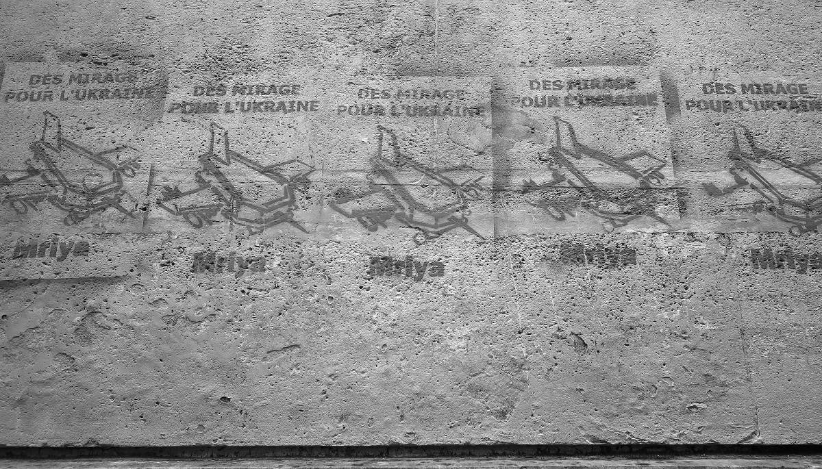 Graffiti showing flying coffins and reading ‘Mirage jets for Ukraine’ in Paris's ninth arrondissement, on 21 June 2024.