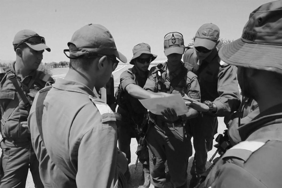 Israeli soldiers searching for the remains of the Syrian missile that fell near the Dimona nuclear facility on 22 April 2021.