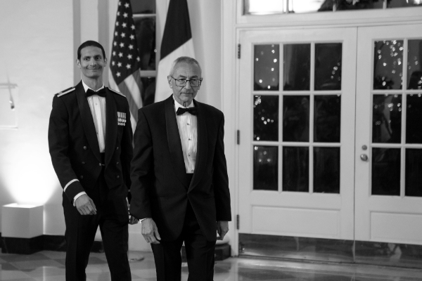 John Podesta, Senior Advisor to the President for Clean Energy Innovation, and Gabriel Podesta, arrive to attend a State Dinner in honour of French President Emmanuel Macron at the White House on 1 December 2022.