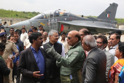 Indian defence minister Rajnath Singh speaks to the media after flying aboard a Tejas fighter jet in September 2019.