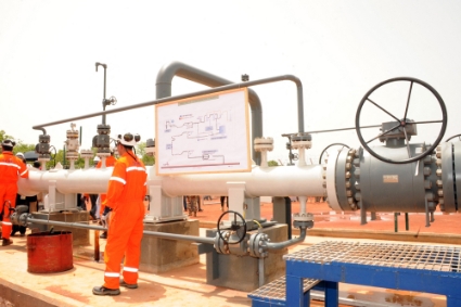 Technicians at an oil pipeline in Badila, Chad, 9 June 2013.