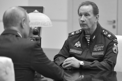 Commander of the Russian National Guard (Rosgvardia) Viktor Zolotov facing Vladimir Putin.