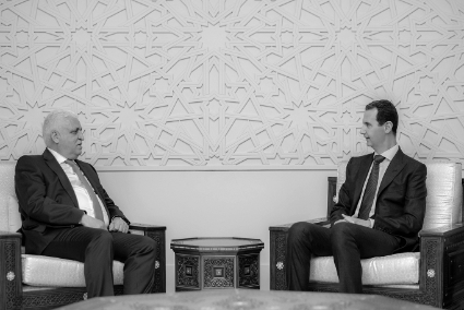 Faleh al-Fayad and Bachar al-Assad during a previous visit in 2019.