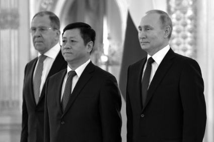 Russian Foreign Minister Sergei Lavrov, Chinese Ambassador to Russia Zhang Hanhui and Russian President Vladimir Putin.