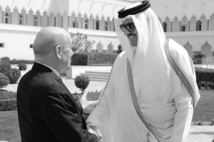 Qatari Emir Sheikh Tamim bin Hamad al-Thani with French Foreign Minister Jean-Yves Le Drian in Doha, Qatar, 28 March 2022.