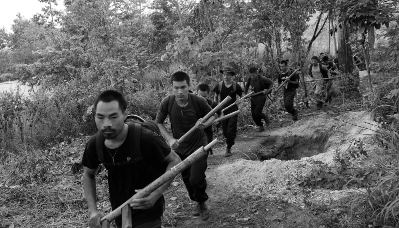 Members of the People's Defence Force, the armed wing of the civilian National Unity Government, taking part in training at a camp near the Myanmar-Thai border, 8 October 2021.