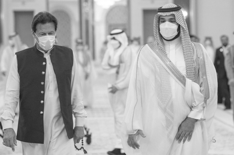 Prince Mohammed bin Salman (R) talking to Pakistan's prime minister, Imran Khan (L) in Riyadh, Saudi Arabia, 8 May 2021.