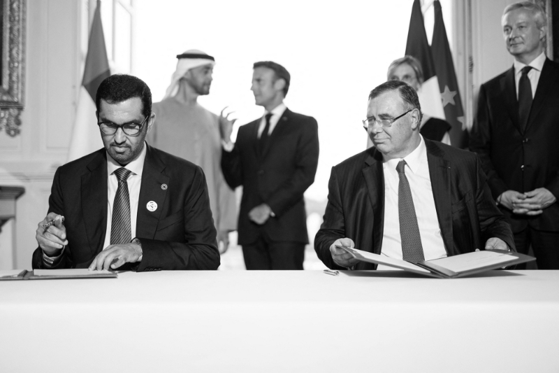 Sultan Ahmed al-Jaber, CEO of Adnoc, and Patrick Pouyanné, CEO of TotalEnergies, at a signing ceremony before a state dinner in France on 18 July, 2022.