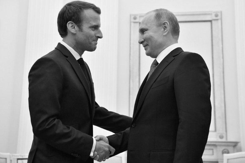 Emmanuel Macron and Vladimir Putin.
