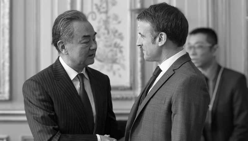 French President Emmanuel Macron and Chinese Foreign Minister Wang Yi in Paris on 20 February 2024.