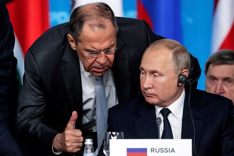 Russian foreign minister Sergey Lavrov with President Vladimir Putin.