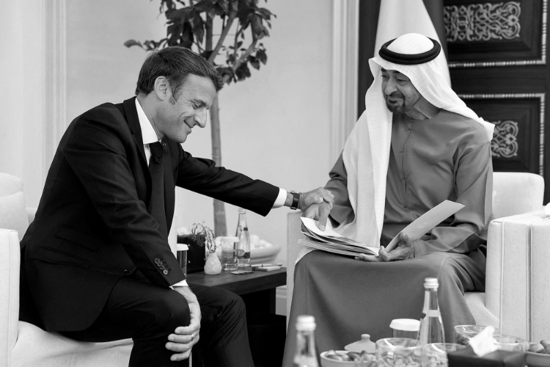 French President Emmanuel Macron with Mohammed bin Zayed Al Nahyan in Abu Dhabi, United Arab Emirates, May 15, 2022.