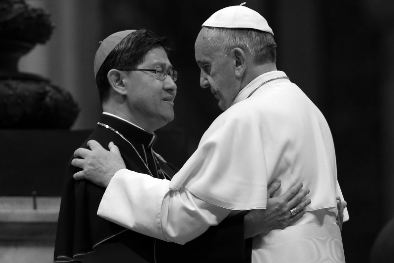 Filipino-born Cardinal Antonio Luis Gokim Tagle with Pope Francis in 2013.